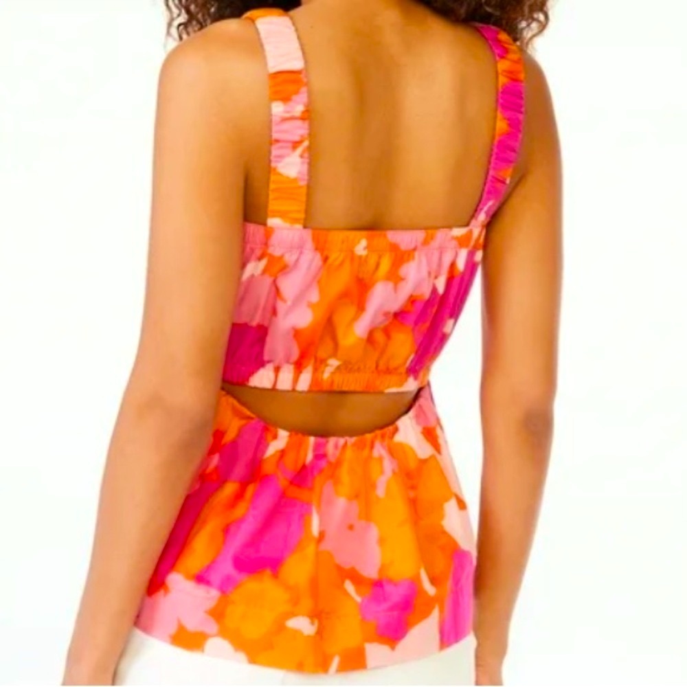 Free assembly, pink and orange tank top with cut out on back.